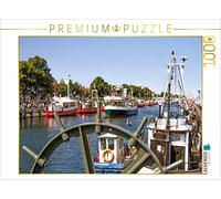 Puzzle · Bateaux de pêche et Bateaux à passagers sur l'Alten Strom à | Warnemünde · L'Alte Strom à Warnemünde · 1000 pièces · Format assemblé 64 × 48 cm · CALVENDO Puzzle