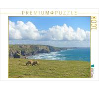 Puzzle CALVENDO Deux moutons en train de paître devant un paysage côtier spectac