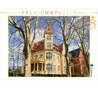 Puzzle CALVENDO Güstrow, la « Villa jaune » au 16 de la Grabenstraße, baignée pa