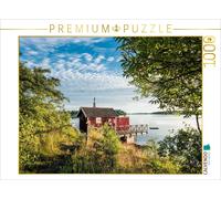 Puzzle CALVENDO Une cabane en bois au bord de la mer | 1000 pièces, format assem