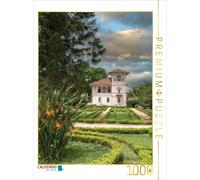 Puzzle CALVENDO Une dépendance dotée d'un jardin romantique et d'une flore magni