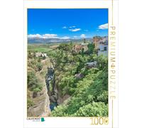 Puzzle · Une Vue Depuis Le Pont Ponte Nuevo sur Le vaste Paysage | Perchée sur un plateau rocheux, la pittoresque ville de Ronda… · 1000 pièces · Format assemblé 64 × 48 cm · CALVENDO Puzzle