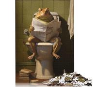 Puzzle de 1000 pièces en Papier Journal représentant Une Grenouille sur Les Toilettes. Jeu de Puzzle pour Adultes. Jouet éducatif et personnalisé. Dimensions : 38 x 26 cm.