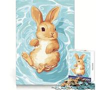 Puzzle de 1000 pièces pour Adultes Illustration d'un Lapin nageant dans l'eau Jeu Intelligent et Amusant Motif Assembler Cadeau précieux (38x26cm)