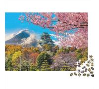Puzzle de 1000 pièces représentant Un château Japonais au Printemps, avec Vue sur Les cerisiers en Fleurs et Les Montagnes. Jeu éducatif pour Adultes, Belle décoration, défi, idéal comme38 x 26 cm