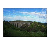 Puzzle de 2000 pièces représentant la Route des Jardins de Knysna, en Afrique du Sud. Illustration, Souvenir de Voyage, 100 x 70 cm.