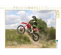 Puzzle · Image d'action d'un Pilote de Motocross en Train de Sauter avec sa | moto · Racer en train de sauter · 1000 pièces · Format assemblé 64 × 48 cm · CALVENDO Puzzle