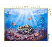 Puzzle · La Grenouille hiberne Bien à l'abri, au Fond Tranquille de l'étang | Une grenouille hiberne, bien blottie au fond d'un étang… · 1000 pièces · Format assemblé 64 × 48 cm · CALVENDO Puzzle