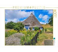 Puzzle · La Maison Historique des veuves de la paroisse à Groß Zicker | À la découverte de la plus belle péninsule de Rügen · 2000 pièces · Format assemblé 90 × 67 cm · CALVENDO Puzzle
