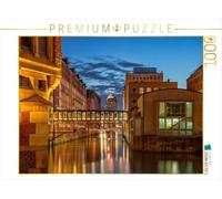 Puzzle · La Speicherstadt à Hambourg, près du Brooksfleet | Entre briques, eau et lumière · 1000 pièces · Format assemblé 64 × 48 cm · CALVENDO Puzzle