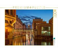 Puzzle · La Speicherstadt à Hambourg, près du Brooksfleet | Entre briques, eau et lumière · 2000 pièces · Format assemblé 90 × 67 cm · CALVENDO Puzzle