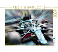 Puzzle · L'Allemand Sebastian Vettel, Quadruple Champion du Monde, a Fait | ses débuts en 2021 au sein de l'écurie britannique Aston Martin · 1000 pièces · Format assemblé 64 × 48 cm · CALVENDO Puzzle