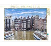 Puzzle · Le Damrak et Ses Maisons dansantes à Amsterdam | Découvrir les canaux pittoresques · 2000 pièces · Format assemblé 90 × 67 cm · CALVENDO Puzzle