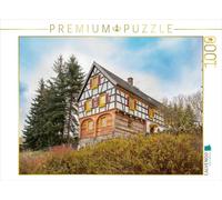 Puzzle · Maison à colombages à Ruderitz - récemment restaurée | Ancienne maison à colombages restaurée · Randonnée dans la… · 1000 pièces · Format assemblé 64 × 48 cm · CALVENDO Puzzle
