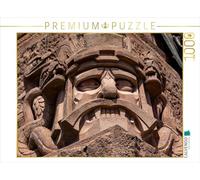 Puzzle · Masque de tête en grès grondant avec des Serpents | Détails d'un monument · Le monument du Kyffhäuser · 1000 pièces · Format assemblé 64 × 48 cm · CALVENDO Puzzle