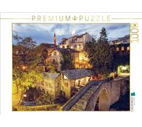 Puzzle · Mostar- Vue sur Le Petit Pont de Pierre en Forme d'arc | Une architecture ottomane enchanteresse d'une beauté mystique · 1000 pièces · Format assemblé 64 × 48 cm · CALVENDO Puzzle