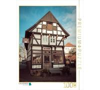 Puzzle · orfèvres | Maison à colombages à Bad Essen · 1000 pièces · Format assemblé 64 × 48 cm · CALVENDO Puzzle