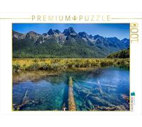 Puzzle · Reflets dans un lac de montagne aux eaux limpides | 1000 pièces · Format assemblé 64 × 48 cm · CALVENDO Puzzle