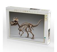 Puzzle · Squelette de pachycéphalosaure avec crâne en dôme sur Le côté | Un squelette de dinosaure se tenant debout avec un dôme crânien… · 1000 pièces · Format assemblé 64 × 48 cm · CALVENDO Puzzle