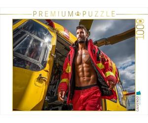 Puzzle · Un médecin urgentiste séduisant avec Un Six-Pack Devant Un | hélicoptère de sauvetage · Un médecin mus t sexy en tenue… · 1000 pièces · Format assemblé 64 × 48 cm · CALVENDO Puzzle
