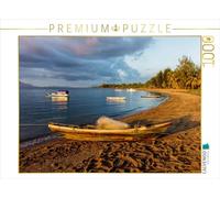 Puzzle · Une Destination de rêve en Indonésie, sur l'île paradisiaque de | Flores · Bateau sur une plage de sable au nord de Flores, en… · 1000 pièces · Format assemblé 64 × 48 cm · CALVENDO Puzzle