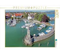 Puzzle · Une Illustration tirée du Calendrier de Lindau | L'île des chercheurs de bonheur · Vue depuis le nouveau phare… · 1000 pièces · Format assemblé 64 × 48 cm · CALVENDO Puzzle