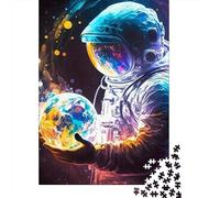 Puzzles Jigsaw 1000 Pièces Astronaute Holding Planète Puzzles 70x50cm/1000pcs pour Enfants Cadeau Jeu D'Intelligence Pression Réduite DIY Carton