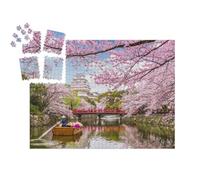 puzzleYOU : Calendrier de l'Avent | « Château majestueux surplombant la Ville de Himeji Pendant la Floraison des cerisiers au Japon »