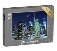puzzleYOU : Puzzle de 2000 pièces « Manhattan avec la Statue de la Liberté : Skyline de Nuit, New York »