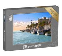 puzzleYOU : Puzzle de 2000 pièces « Phare et Ancien Port de pêche du Grau du Roi dans Le Parc Naturel zoologique de Camargue. Sud de la France. »