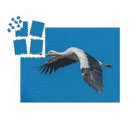 puzzleYOU : Smart Sorted® | Puzzle Photo 1000 pièces « Cigogne Blanche en vol dans Le Ciel Bleu »