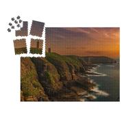 puzzleYOU : Smart Sorted® | Puzzle Photo 1000 pièces « Paysage du Phare du Cap Fréhel dans Les Côtes d'Armor. Coucher de Soleil sur Le Cap Fréhel. »