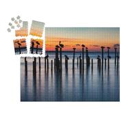 puzzleYOU : Smart Sorted® | Puzzle Photo 1000 pièces « Pélicans au Coucher du Soleil sur de Vieux piliers »