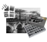 puzzleYOU : Smart Sorted® | Puzzle Photo 1000 pièces « Pont de Pierre Pont de Pierre sur la Garonne à Bordeaux avec l'église St Michel »