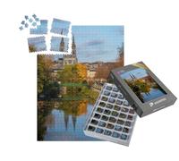 puzzleYOU : Smart Sorted® | Puzzle Photo 1000 pièces « Vue de Paysage d'une église à Niort, France. l'eau reflète la Vue en Double »