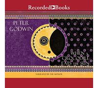Quand Un Crocodile Mange Le Soleil : Un mémoire d'Afrique [Import]