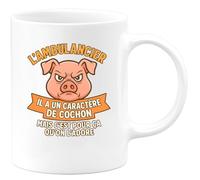 quotedazur - Mug Humour L'ambulancier Il A Un Caractère De Cochon Mais C'est Pour Ça Qu'on L'adore - Idée Cadeau Tasse Originale Pour Ambulancier Fier