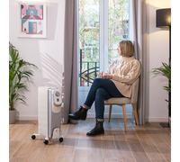 Radiateur de fioul de 7 modules, 1500 W y 360º technologie avec 3 niveaux de puissance, couverture de 18 m², collecteur à câble, commande simple, poignée, roues et double système de sécurité.