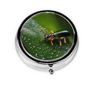 Rainbows Insectsa Petite boîte à médicaments à trois compartiments qui peut être placée dans votre poche ou votre sac à main et peut stocker des vitamines.