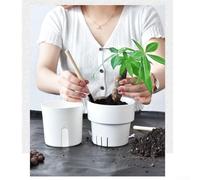 Récipient à arrosage automatique pour plantes d'intérieur qui soutient les cycles de transpiration naturels sans minuterie externe ni pompe (A)