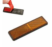 Réflecteur rectangulaire avec adhésif jaune.