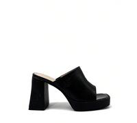 REVREAL Mules à plateforme et talons blocs Ces mules à plateforme noires respirent un style et une polyvalence sans effort, ce qui en fait un choix incontournable pour toute garde-robe moderne. Dotées