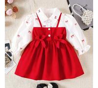 Robe A-line à manches bouffantes pour bébés filles. Coupe A-line classique convenant à différents types de morphologie de bébé. Le design distinctif du col ajoute une touche de formalité, tandis que l