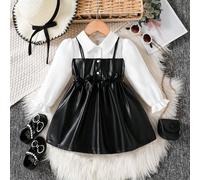 Robe A-line à manches bouffantes pour bébés filles. Silhouette classique A-line convenant à différents types de morphologie de bébé. Le design distinctif du col ajoute une touche de formalité, tandis 