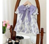 Robe ample et élégante pour jeune fille, fillette et bébé fille avec col nœud, imprimé floral blocs de couleurs. Robe d'été et de printemps pour fille en lavande, lilas, violet à fleurs. Robe de thé p