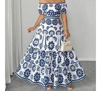 Robe maxi évasée à l'épaule dénudée, imprimé bicolore, avec nœud dans le dos et taille ajourée. Élégante pour les sorties, les rendez-vous, les fêtes, les vacances, les moments romantiques. Grandes ta
