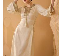 Robe maxi printemps/été pour femmes, en tissu jacquard texturé doré luxueux et élégant. Avec col fleur doré, ruban à gland, décoration de sequins dorés, ceinture de taille perlée, insert en maille, la