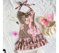 Robe mini pour jeune fille avec imprimé léopard coloré et floral, col drapé, dos nu, volants à l'ourlet, nœud papillon. Avec short intégré. Idéal pour les vacances, Pâques, les concerts, les festivals