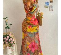 Robe sirène sexy et romantique à col drapé et noué, ornée de patchwork, de fleurs métalliques et d'un grand col à volants, idéale pour les vacances printemps/été. Parfaite pour une croisière, un road 