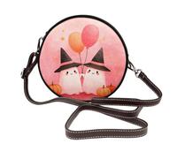 Sac à bandoulière rond en cuir avec motif fantômes roses portant des chapeaux de sorcière